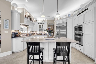 Welcome to an exceptional lakefront residence in the prestigious - photo 28