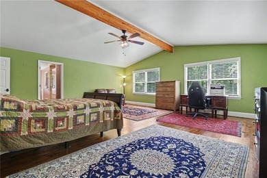 Nestled in a private, picturesque setting, this exceptional - photo 30