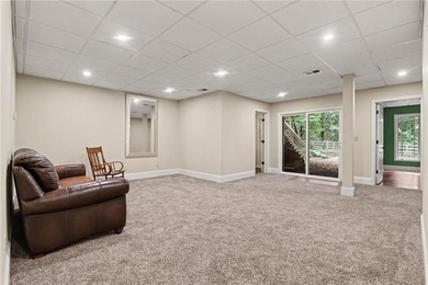Nestled in a private, picturesque setting, this exceptional - photo 39