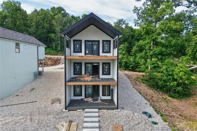 BRAND NEW LAKE HOME AND DOCK!!! The perfect blend of modern - photo 40