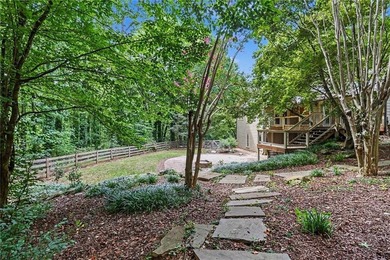 Nestled in a private, picturesque setting, this exceptional - photo 46