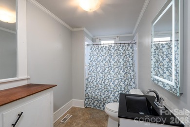 Opportunity awaits in the heart of Kannapolis. This spacious