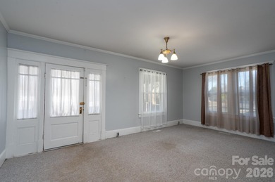 Opportunity awaits in the heart of Kannapolis. This spacious