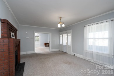 Opportunity awaits in the heart of Kannapolis. This spacious