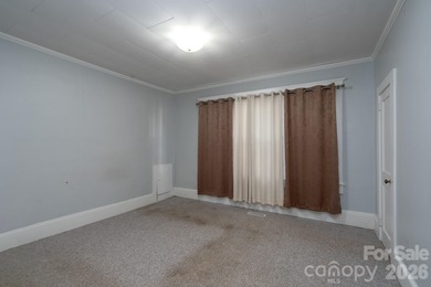 Opportunity awaits in the heart of Kannapolis. This spacious