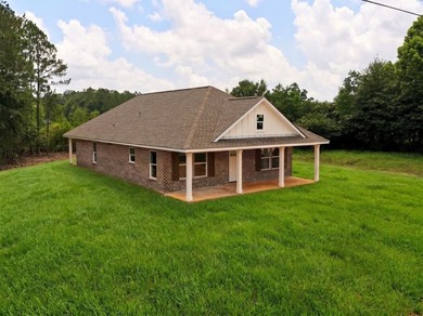 CUTE AS A BUTTON COTTAGE STYLE WATERFRONT home with large front - photo 30