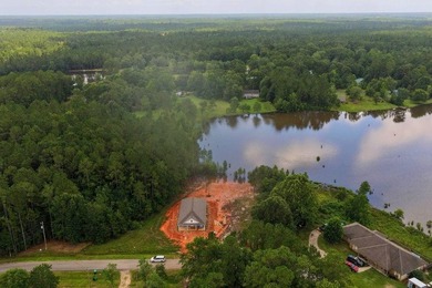 CUTE AS A BUTTON COTTAGE STYLE WATERFRONT home with large front - photo 34