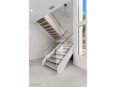 Welcome to 8600 Titleist Circle - where modern design and