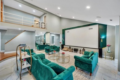 Tucked away on a beautifully landscaped 3/4-acre property, this - photo 5