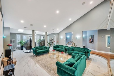 Tucked away on a beautifully landscaped 3/4-acre property, this - photo 6