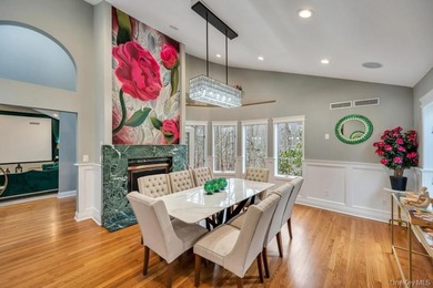 Tucked away on a beautifully landscaped 3/4-acre property, this - photo 9