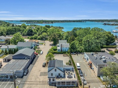 A turn-key investment opportunity in the heart of Mystic. This - photo 1