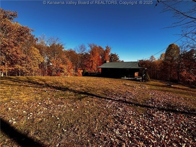 Escape to your own private 15.66-acre mountaintop retreat in - photo 9