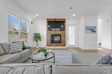 Welcome to this immaculate two-story coastal retreat in the - photo 4
