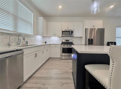 Serene lakefront living on a quiet cul-de-sac in the desirable - photo 6