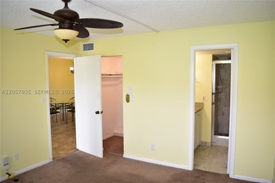 This is a bright, nicely updated condo with a happy vibe. It is - photo 12