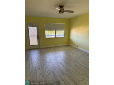 Lake Condo For Sale in Deerfield Beach, Florida