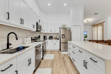 Beautiful one story home in Heron Bay COMPLETELY RENOVATED with - photo 17