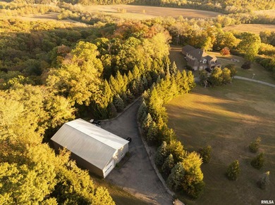 Nestled on over 15 acres of serene countryside, this elegant - photo 35