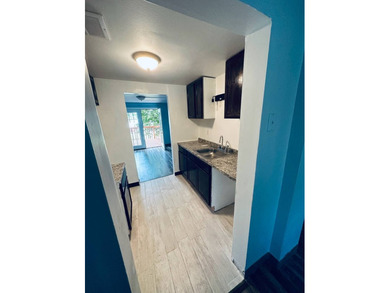 Check out this completely remodeled townhouse located in the - photo 1