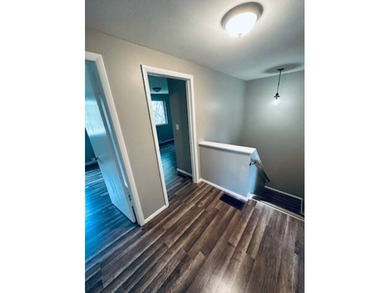 Check out this completely remodeled townhouse located in the - photo 2