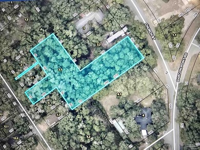 Discover the charm of 1.112 acre wooded lot in Bagdad. Close to - photo 1