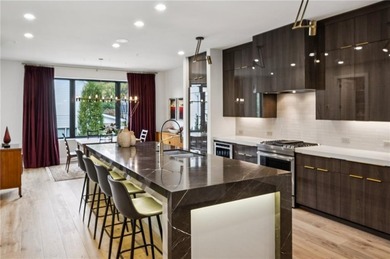 PRIVATE ELEVATOR TO ALL 4 FLOORS! Perfectly positioned in one of