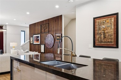 PRIVATE ELEVATOR TO ALL 4 FLOORS! Perfectly positioned in one of