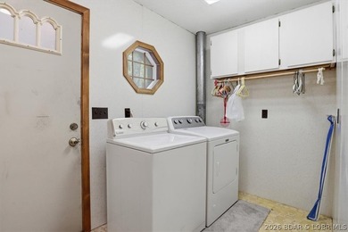 Discover the perfect blend of privacy, space, and lake living on - photo 27