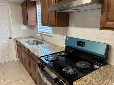 Welcome home to this beautifully remodeled 3-bedroom, 2-bath - photo 6