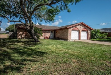 Welcome to this charming 3-bedroom, 2-bath home in the highly - photo 1