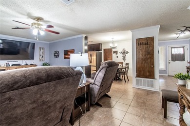 Welcome to this charming 3-bedroom, 2-bath home in the highly - photo 7