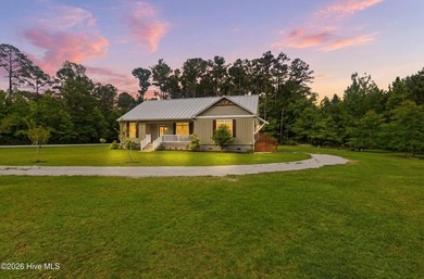 Custom-built and thoughtfully designed, this beautiful home - photo 1