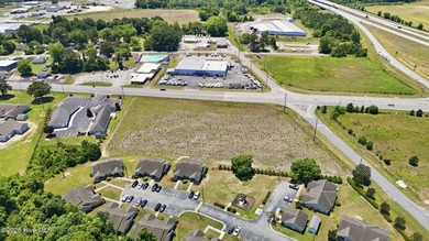 Prime 2.9-acre commercial corner lot on US Hwy 264 W in - photo 8