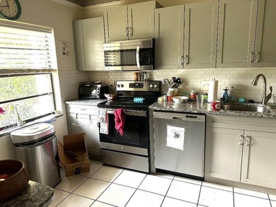 Discover the perfect retirement retreat in Boca Lago! This - photo 2