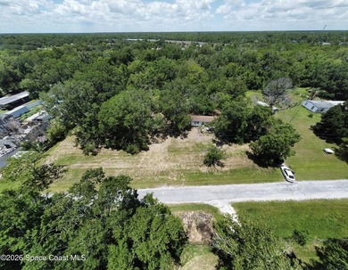 Discover the potential of this 2.6-acre vacant lot, offering a - photo 1