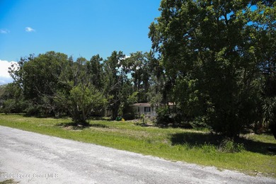 Discover the potential of this 2.6-acre vacant lot, offering a - photo 3