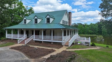 Situated on 50 stunning acres, this 4,400 sq. ft. estate offers - photo 2