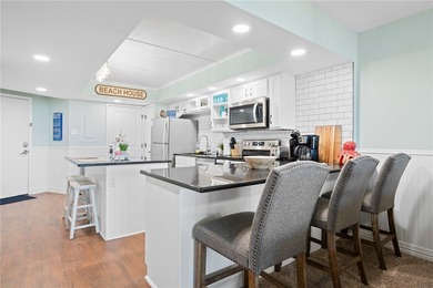 Wake up to sweeping Gulf views in this beautifully renovated - photo 9