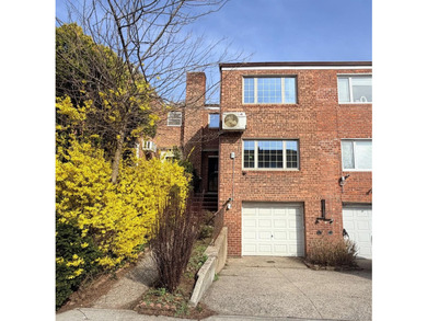This charming one-family home offers three bedrooms, two and a - photo 1