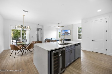 Experience modern luxury and effortless downtown living in this - photo 12