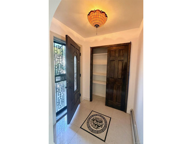 This charming one-family home offers three bedrooms, two and a - photo 6
