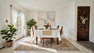 This charming one-family home offers three bedrooms, two and a - photo 8