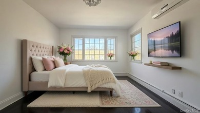 This charming one-family home offers three bedrooms, two and a - photo 10