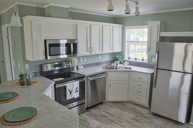Running a Special of 6 Months Free Lot Rent on this Beautiful - photo 6