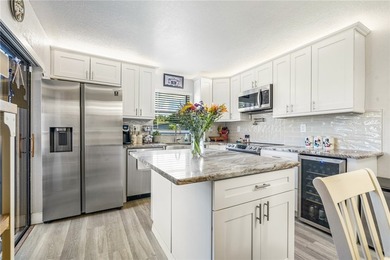 Charming corner unit home with modern updates! The updated - photo 3