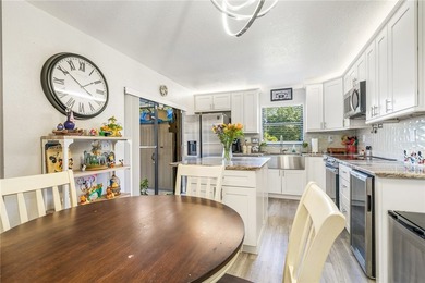 Charming corner unit home with modern updates! The updated - photo 8