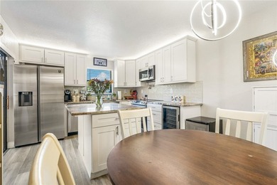 Charming corner unit home with modern updates! The updated - photo 10