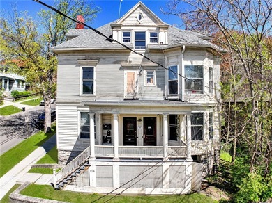 5 STAR 5 UNIT 5 MINUTES TO CORNELL! Impressive architectural - photo 1