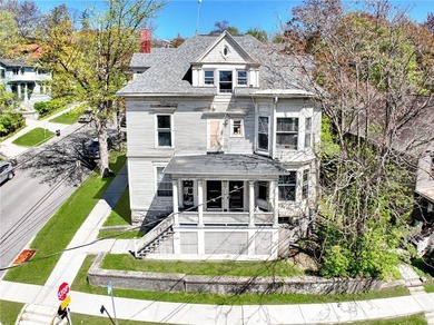 5 STAR 5 UNIT 5 MINUTES TO CORNELL! Impressive architectural - photo 2